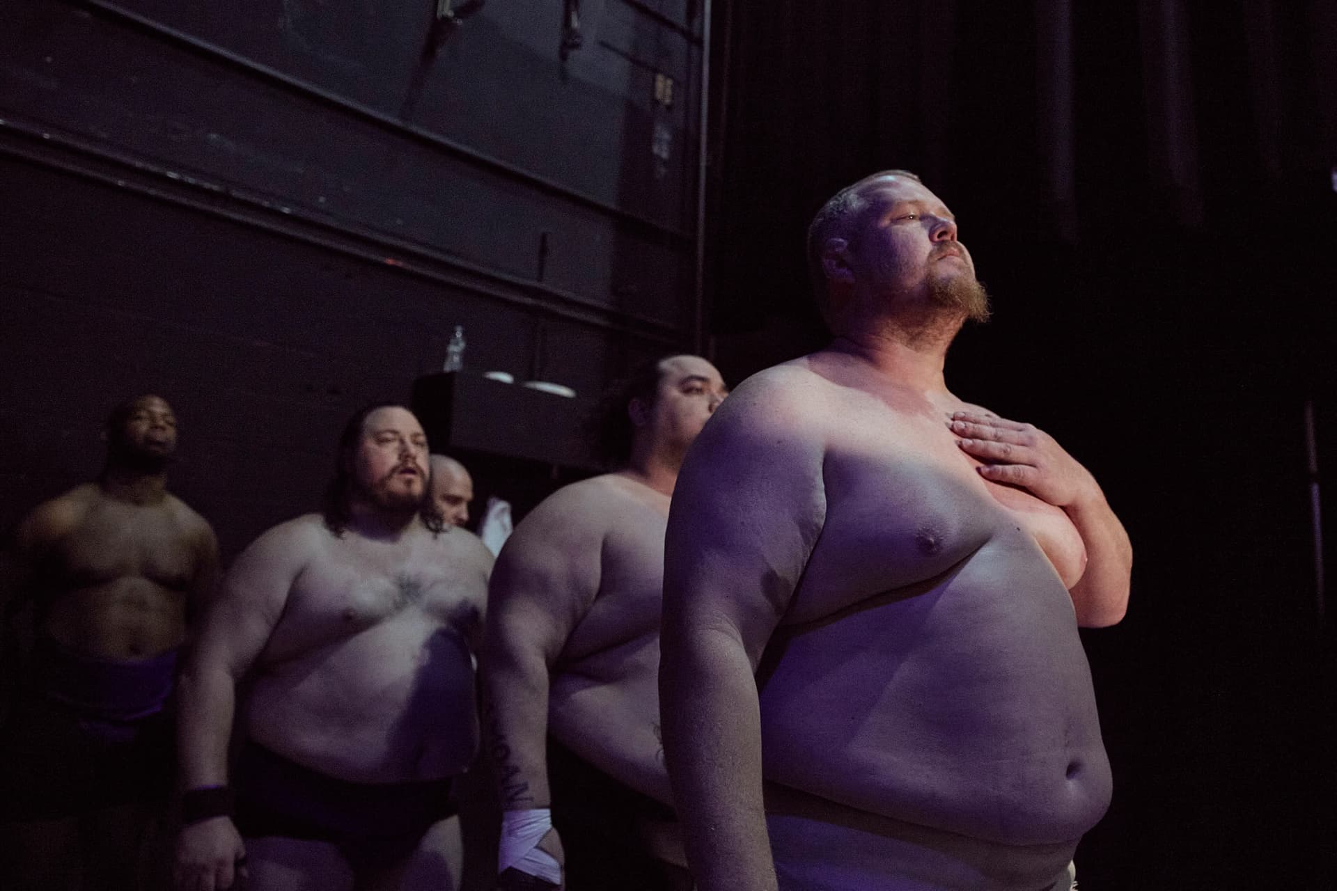Rikishi lined up backstage before competition